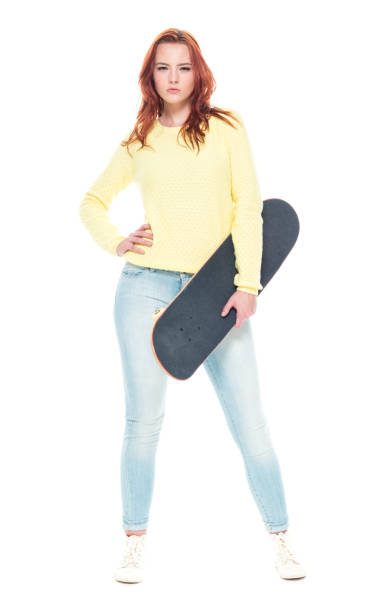 istock Cute female holding a skateboard 1155074620