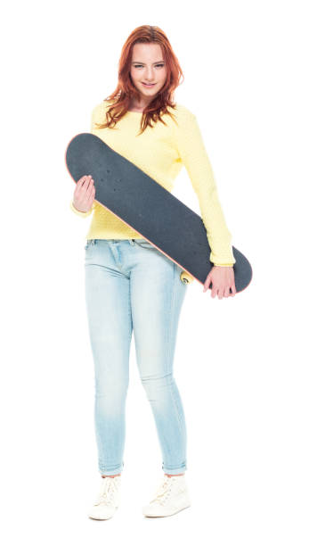 istock Cute female holding a skateboard 1155074629