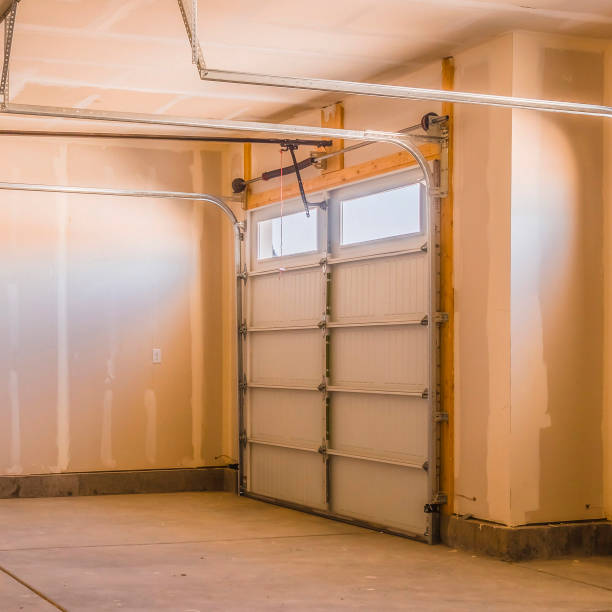 istock Square Interior of a garage under construction with unfinished walls 1155076614