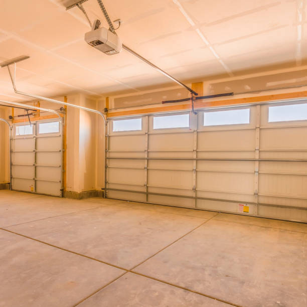 istock Square Interior of an unfinished garage with unpainted walls and ceiling 1155076625