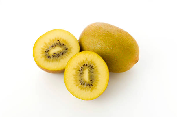 istock gold kiwi on white background 1155079435