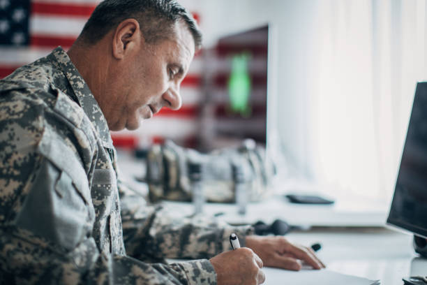 istock American soldier in headquarter control center 1155083748