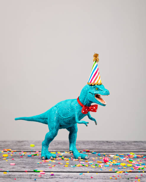 istock Toy Dinosaur at Birthday Party 1155087604