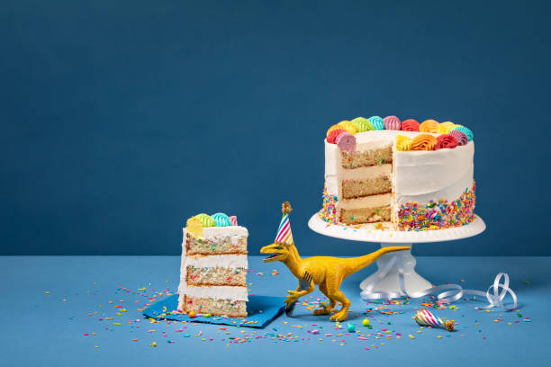istock Dinosaur and Birthday Cake 1155088260
