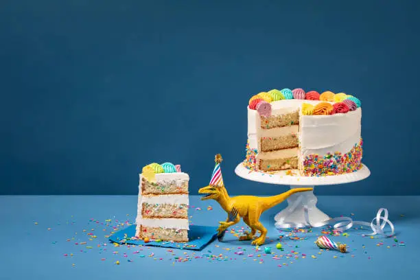 Photo of Dinosaur and Birthday Cake
