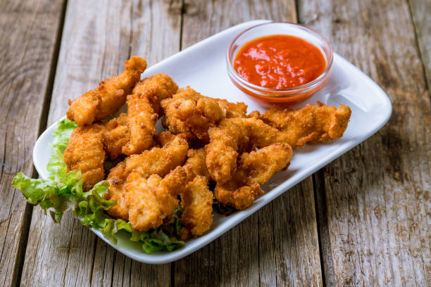 Chicken strips with ketchup stock photo