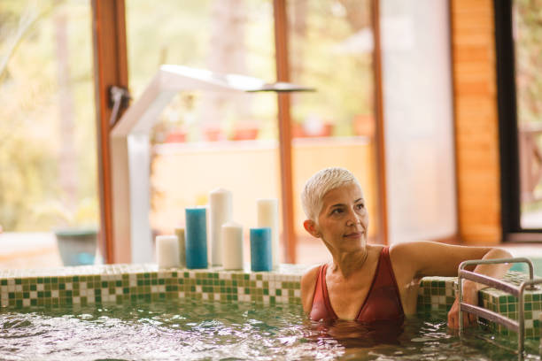 istock Relaxing in a hot tub 1155091305