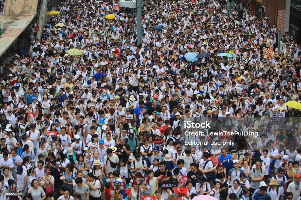 protest against controversial extradition bill Hong Kong- 9 June 2019: the crowd protest in the rally. More than 150,000 protesters with no main organisation, took to the streets of Hong Kong Sunday to oppose a controversial extradition bill Protest Stock Photo