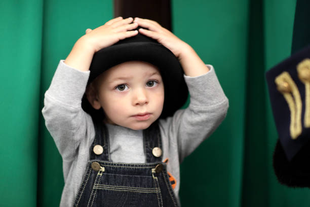 Portrait of a child on a green background