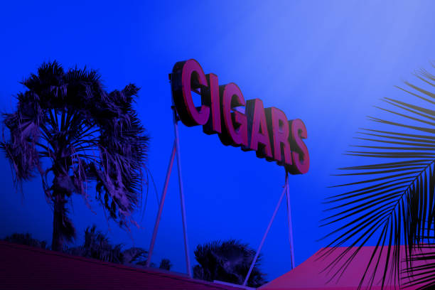 istock cigars sign on roadside over blue night sky 1155099465