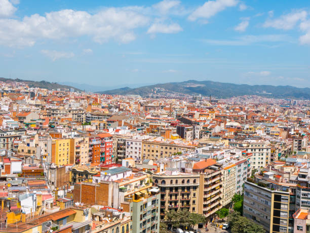 istock Beautiful top view on Barcelona on sunny day, Spain 1155101808