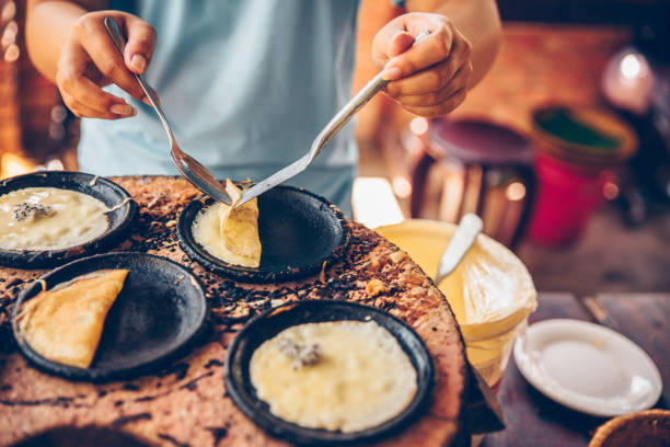 istock Vietnamese small rice pancake - Traditional Vietnamese food Cooking class 1155107337