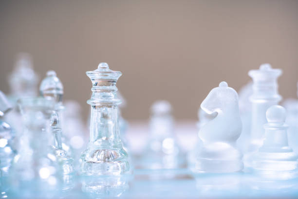 istock Chess board game made of glass, business competitive concept, copy space 1155108704