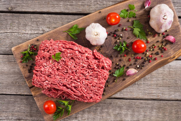 istock Raw minced beef meat with spices and herbs 1155111242