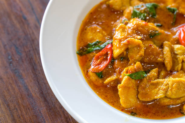 istock Thai Red Curry with Pork on wooden table 1155116378