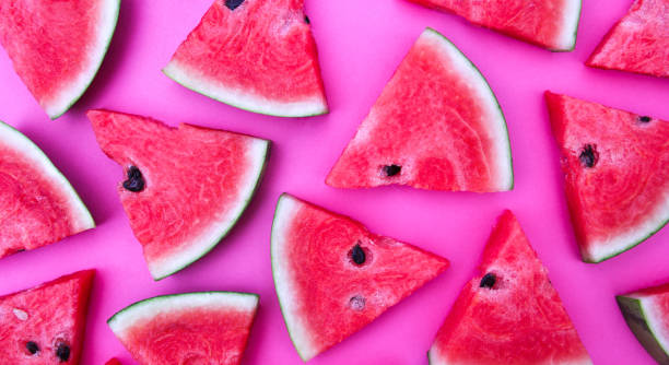 istock Watermelon on the pink backdrop in the studio. 1155120493