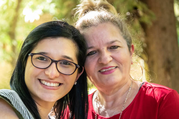 istock Mature woman posing with her daughter 1155125270
