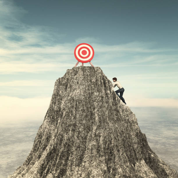 istock Man climbing on a mountain cliff to the red target. This is a 3d render illustration 1155127594