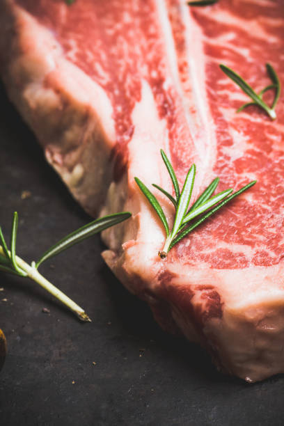istock Raw fresh marble T-bone meat on the rustic background 1155128340
