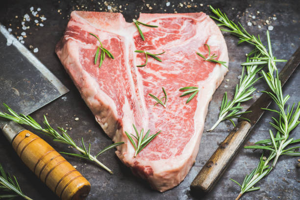 istock Raw fresh marble T-bone meat on the rustic background 1155128388