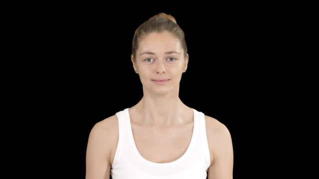 Young woman doing breathing exercise, Alpha Channel