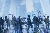 double exposure of business people walking on the street