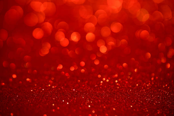 fond abstrait de noël de paillettes rouges - opposition party photos et images de collection