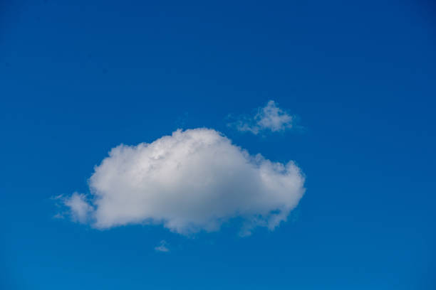 istock blue sky with white clouds over countryside landscape 1155134926