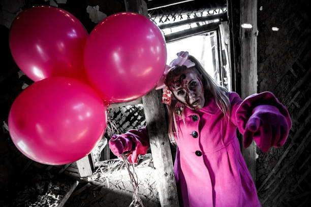 zombie girl in a pretty pink coat - eyes narrowed imagens e fotografias de stock
