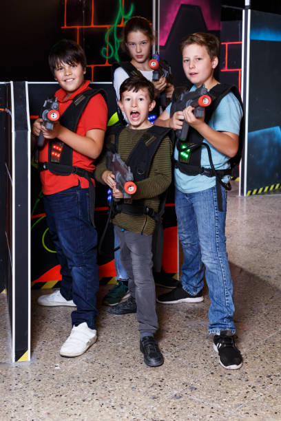 istock Kids posing with laser pistols 1155137680