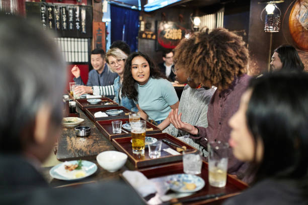 istock Multi-Ethnic Group at Tokyo Sushi Bar and Restaurant 1155137899