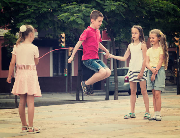 istock children with jumping rope at playground 1155138714