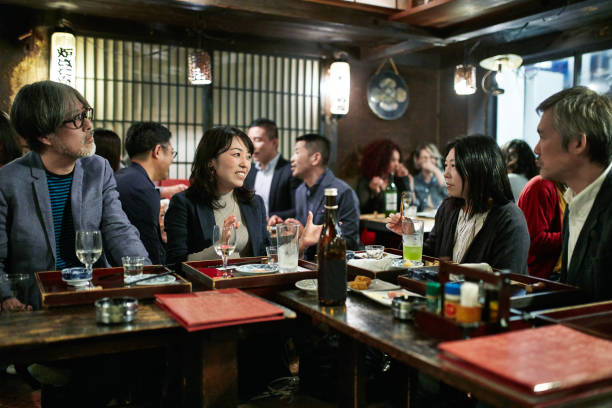 istock Japanese Couples at Tokyo Sushi Bar and Restaurant 1155138875