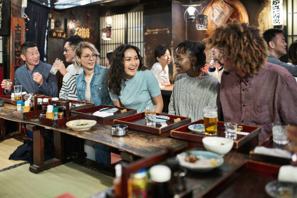 istock Multi-Ethnic Group at Tokyo Sushi Bar and Restaurant 1155138909