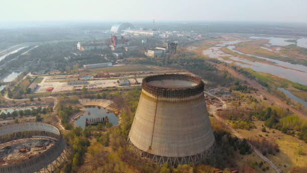 Chernobyl nuclear power plant, Ukrine. Aerial view Chernobyl nuclear power plant. Cooling tower overlooking the nuclear power plant in Chernobyl. View of the destroyed nuclear power plant. Chernobyl nuclear power plant, Ukrine. Aerial view. nuclear reactor stock pictures, royalty-free photos & images