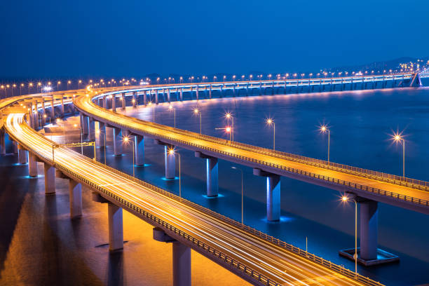 istock Night view of the sea bridge 1155142461