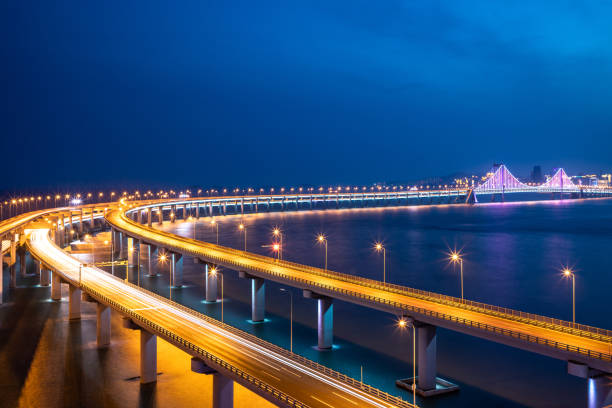istock Night view of the sea bridge 1155142615