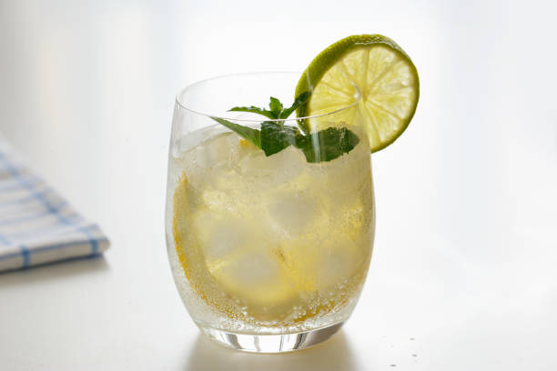istock Mineral water with lemon in a steaming glass 1155145037