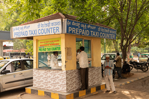 BANGALORE INDIA June 3, 2019 : Prepaid taxi counter at Bengaluru railway station, Karnataka, India