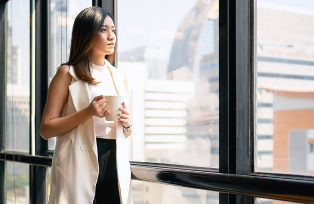 istock Thoughtful businesswoman looking away 1155147465