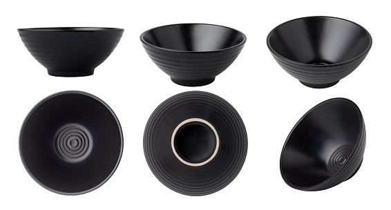 Black ceramic bowls isolated on white background