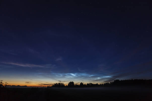 istock Noctilucent cloud (NLC, night clouds, silver clouds), cloud-like phenomena in mesosphere 1155154398