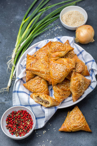 istock Small pies with meat samosa - oriental cuisine. 1155155301
