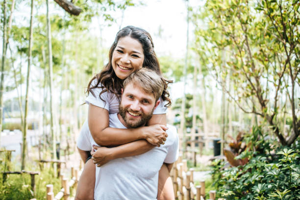 istock Happy Smiling Couple diversity in love moment together 1155155332