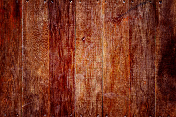 istock Old wooden boards with screws 1155155343