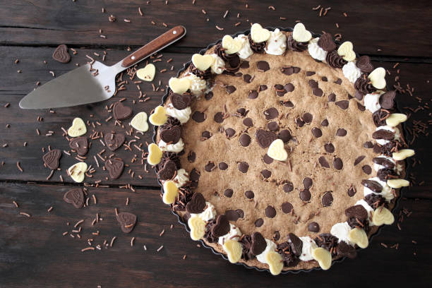 istock Chocolate chip cookie cake on wooden background 1155158492