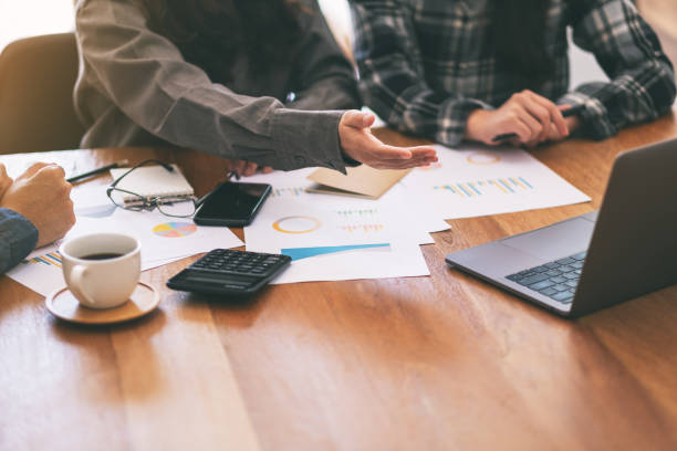 istock businessman working and presenting business in a meeting 1155160225