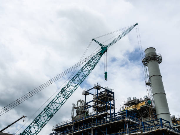 Power Plant construction phase and crane for lifting heavy equipment