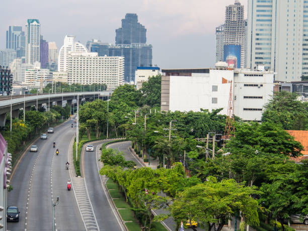 istock Downtown and traffic road of green space 1155160364