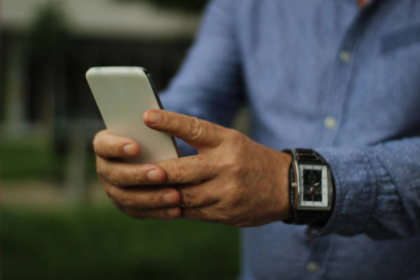 istock Senior man with smart phone 1155160419